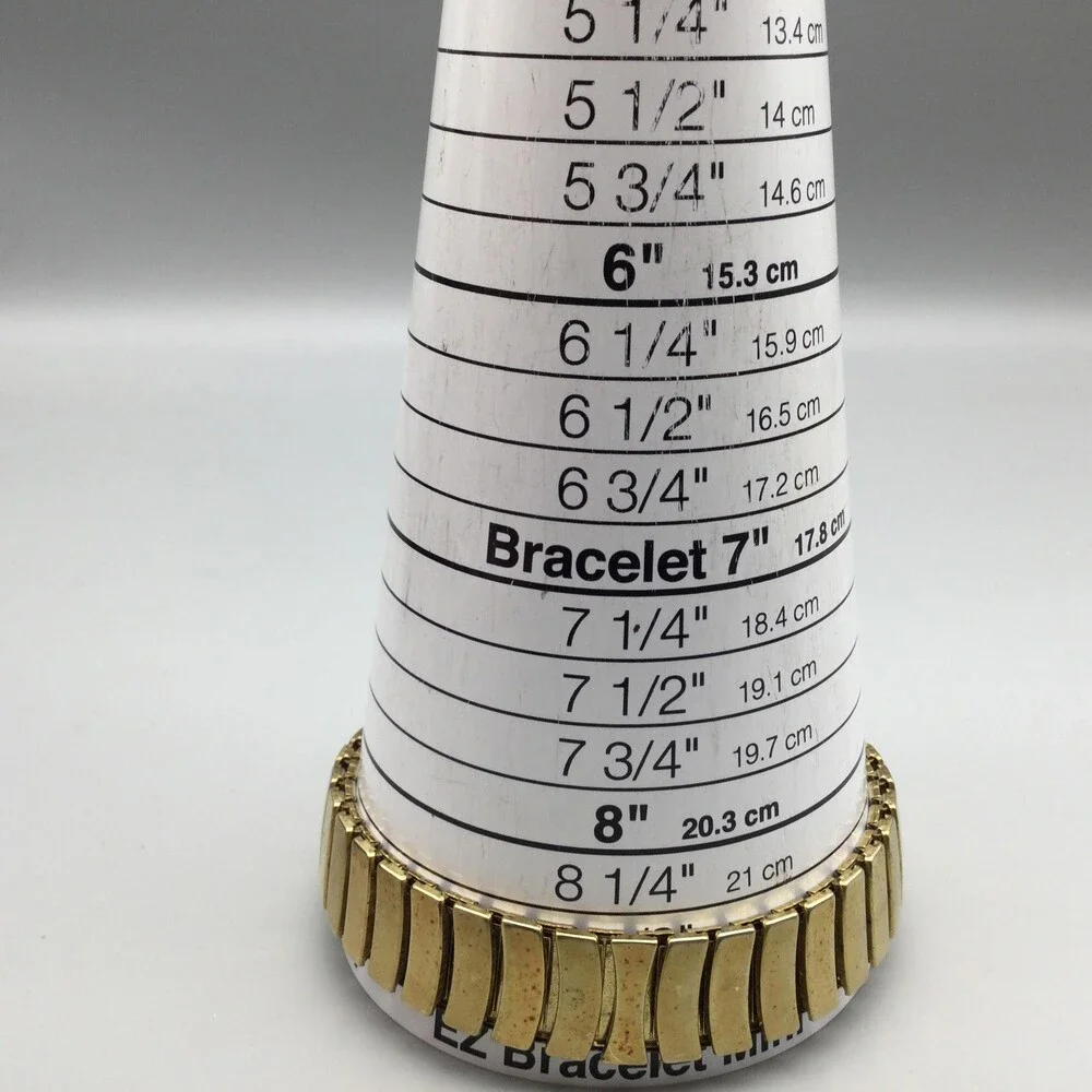 Delta Burke Womens Watch 25mm Gold Tone Asymmetrical Stretch Band New Battery